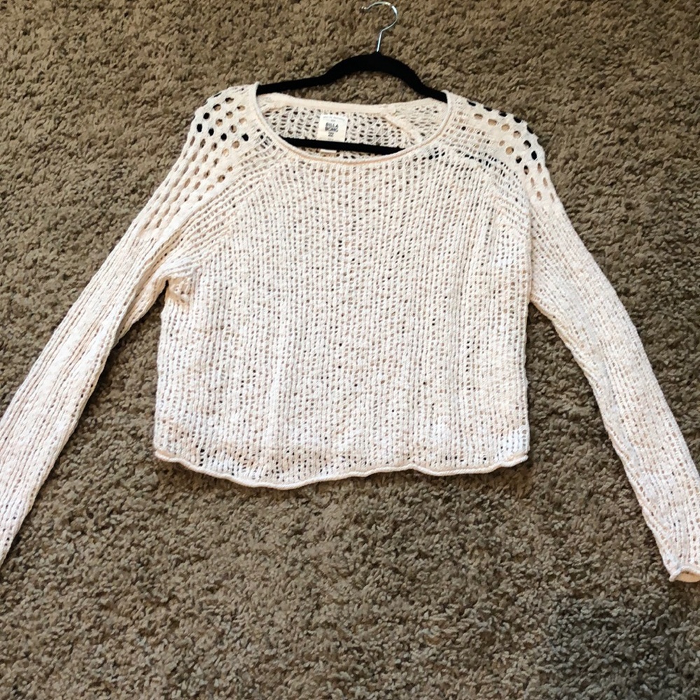 Sweater with holes